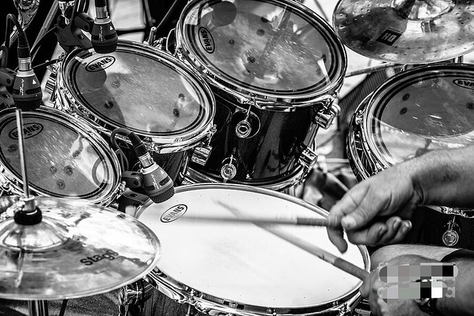 close-up-of-drummer-hands-and-drum-kit-peter-noyce_1645598113577